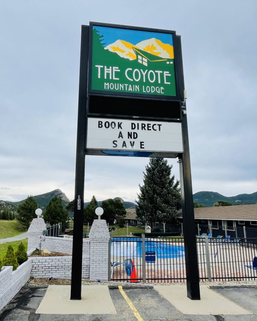 The Coyote Sign with Pool in the background