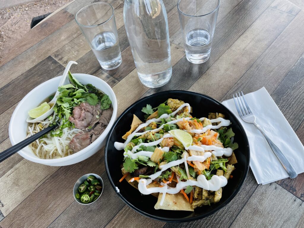 Meal at 98 Center in Moab Utah - vegan bahn mi nachos and beef pho